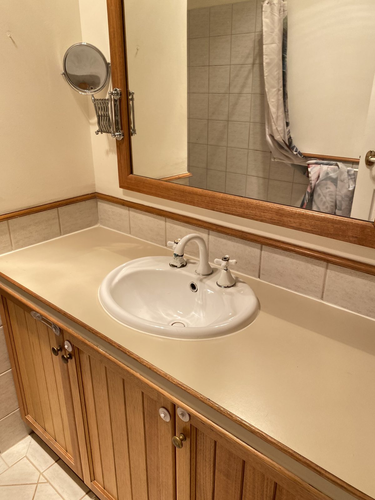 Clean bathroom vanity, basin, tapware and mirror after a vacate clean in Claremont